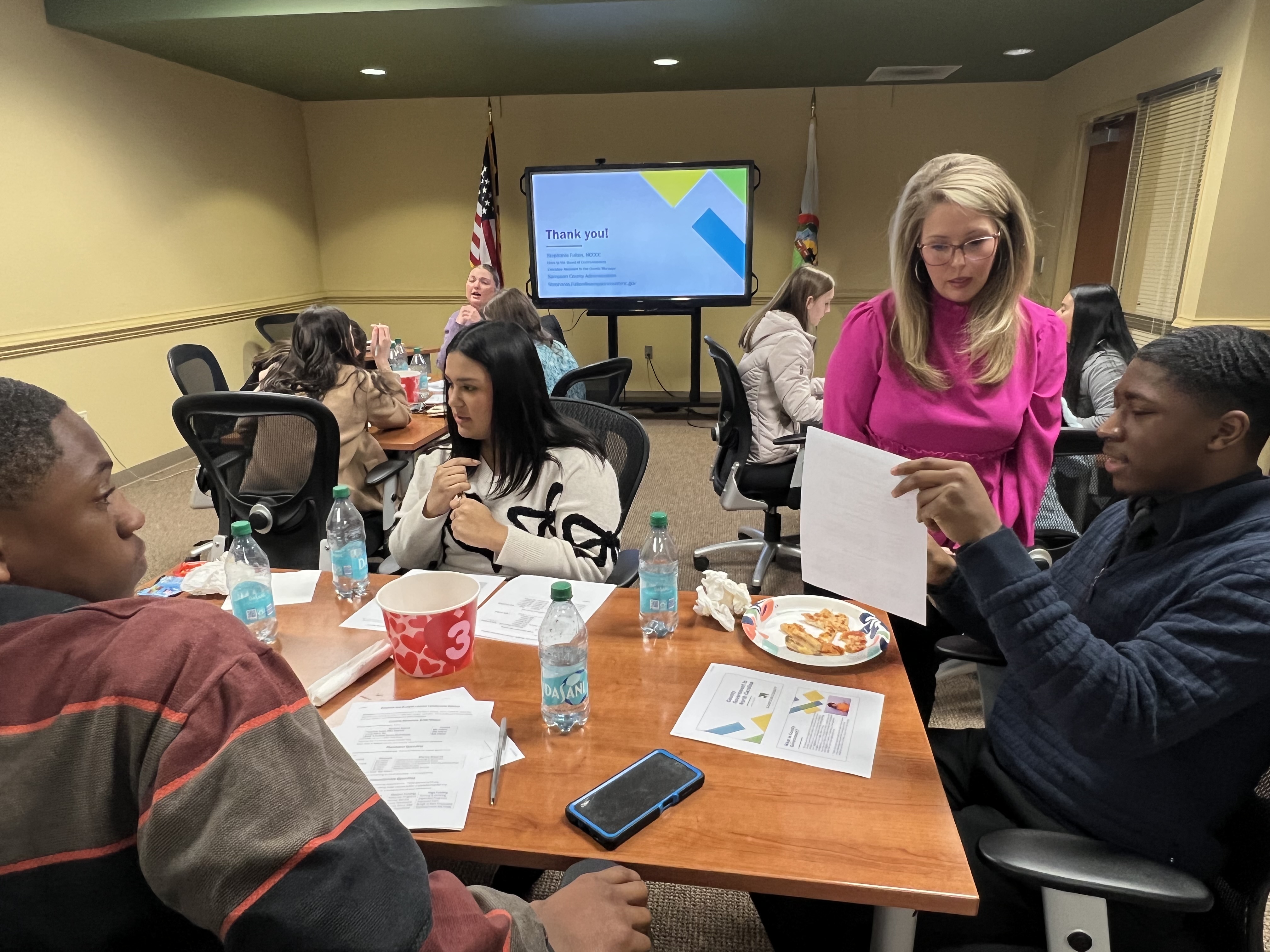 County clerk teaching students in a group.jpg