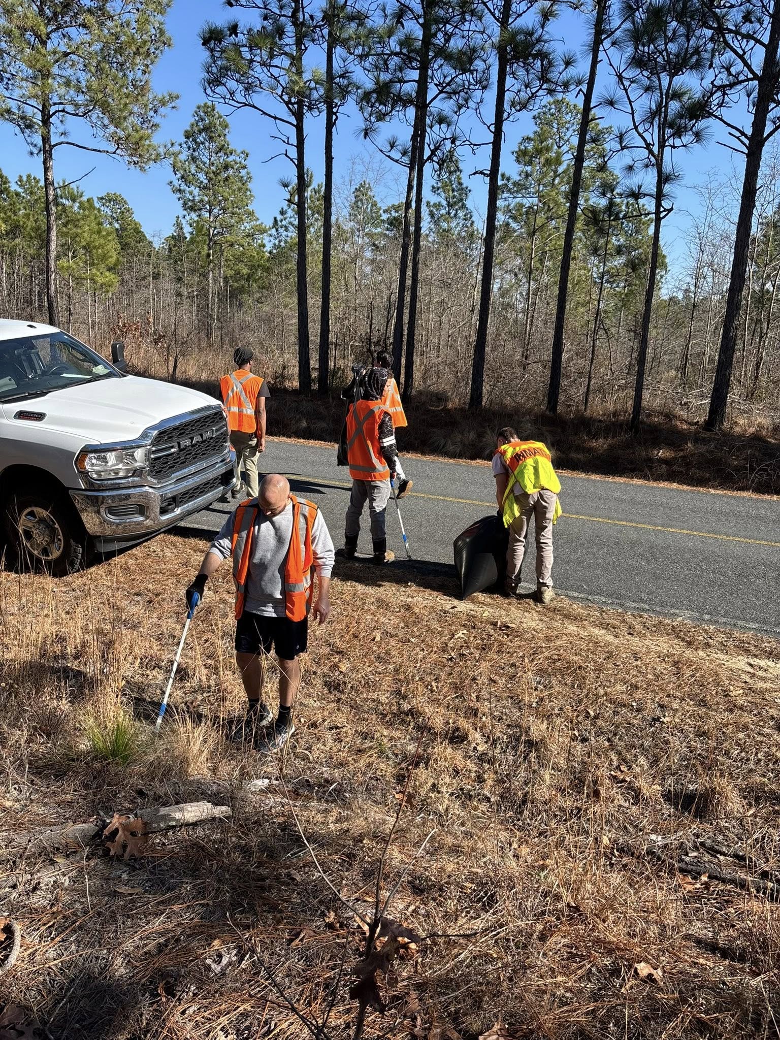 staff cleaning on the roadside.jpg
