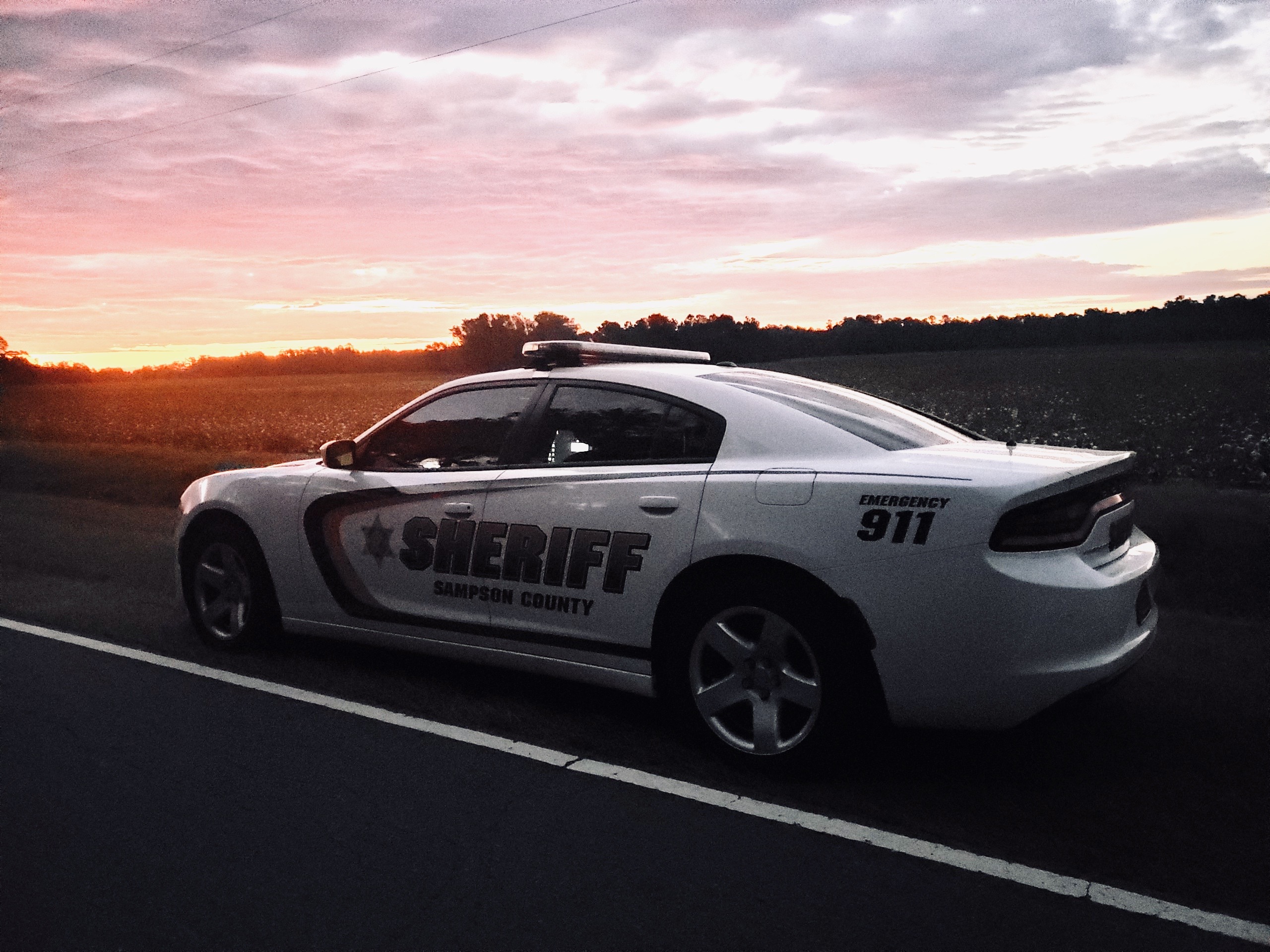 deputy vehicle with Sunset.jpg